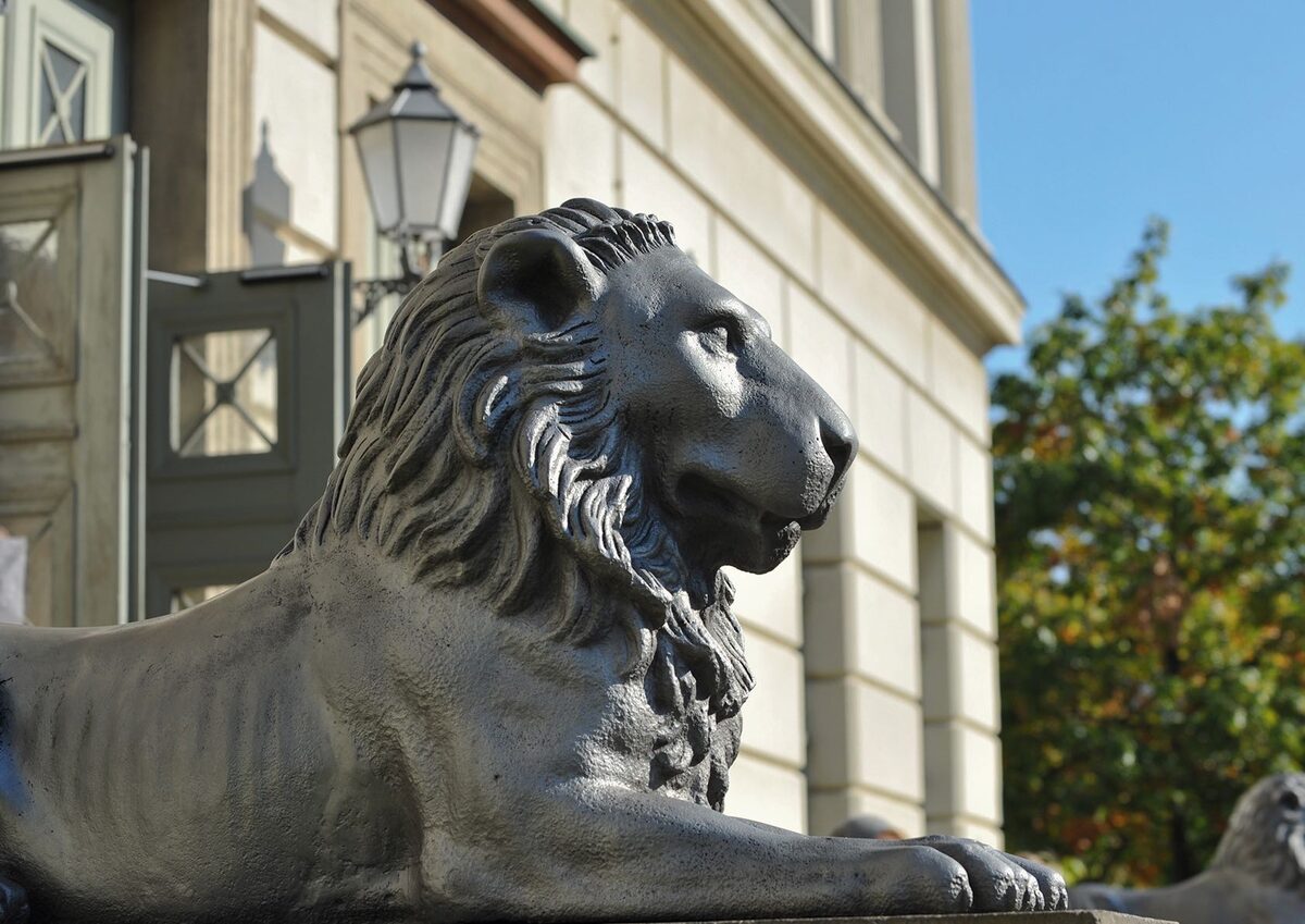 A stone lion statue, photographed from the front